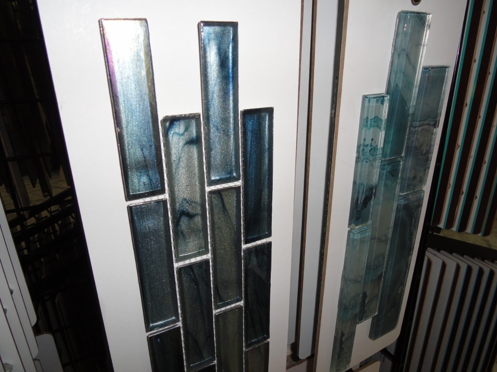 Blue iridescent glass tile panels in showroom