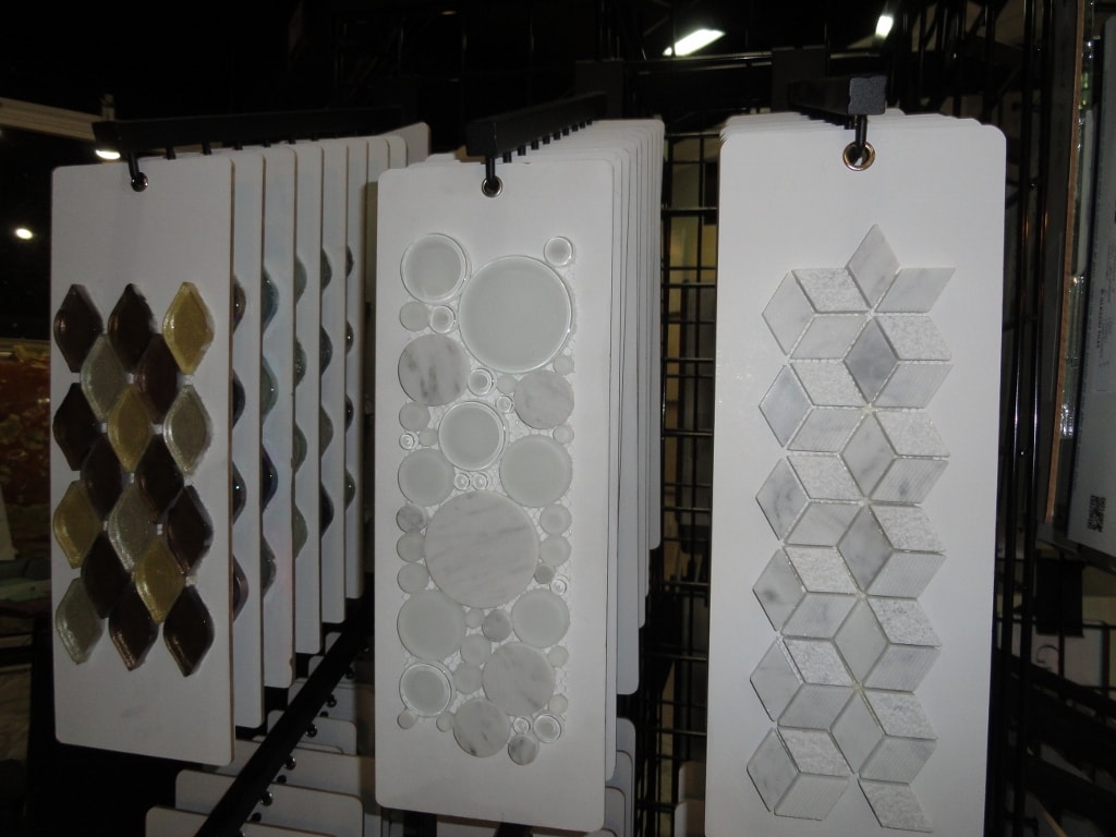 Diamond glass and bubble circle tile sample boards on rack